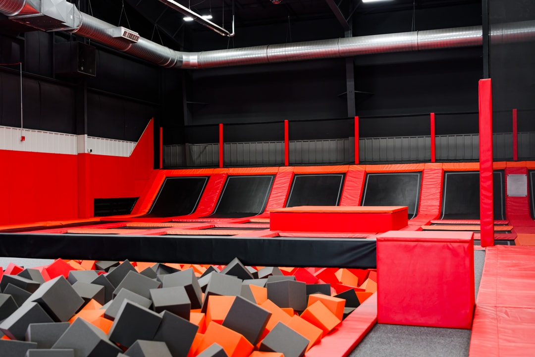 Balance beam and foam pits