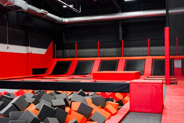 Balance beam and foam pits