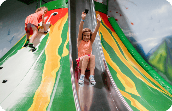 Kids sliding at Lava Island