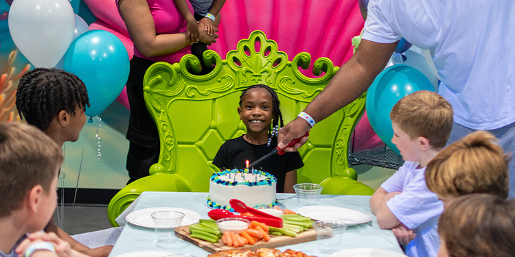 Girl celebrating his birthday at Lava Island
